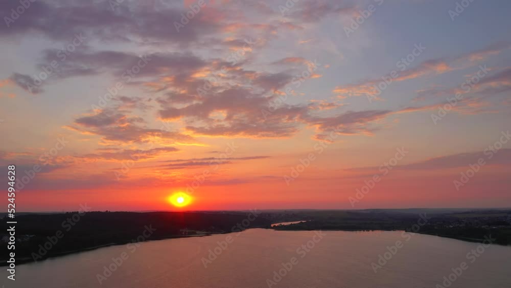 The sun sets over the horizon. Filmed in UHD 4k video. The sun sets over the horizon. Filmed in UHD 4k video.