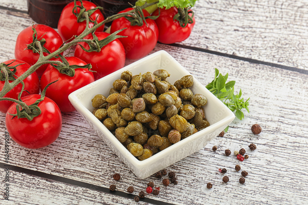 Marinated green capers in the bowl Marinated green capers in the bowl