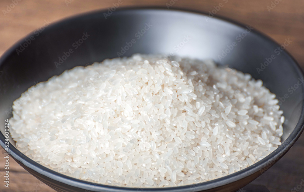 Oats, rice in bamboo baskets, wooden spoons, bowls, rice jars Oats, rice in bamboo baskets, wooden spoons, bowls, rice jars