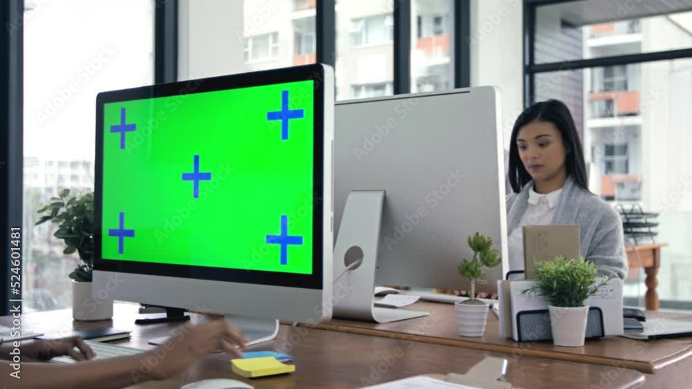 Green screen, mockup and tracking markers with business people at work on computer . Women workers at company desk in corporate advertising office working on desktop technology in a marketing startup Green screen, mockup and tracking markers with business people at work on computer . Women workers at company desk in corporate advertising office working on desktop technology in a marketing startup