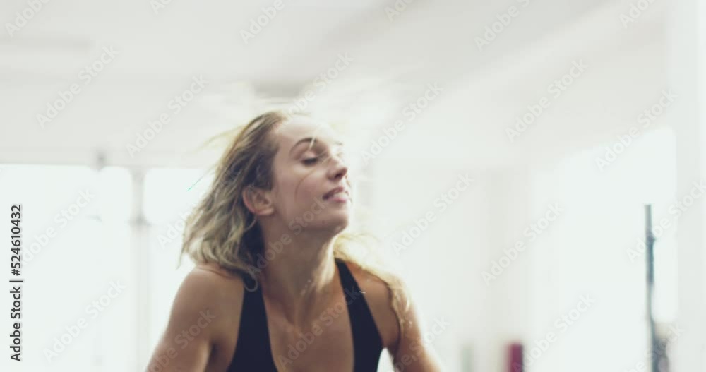 Fitness, exercise and training woman on sports bike workout in health and wellness gym center. Motivation, beauty and strong body instructor sweating from exercising on cardio equipment Fitness, exercise and training woman on sports bike workout in health and wellness gym center. Motivation, beauty and strong body instructor sweating from exercising on cardio equipment