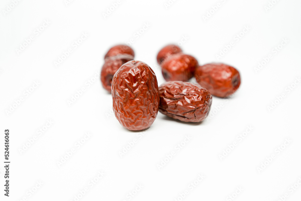 Obraz premium Red dates on blank background