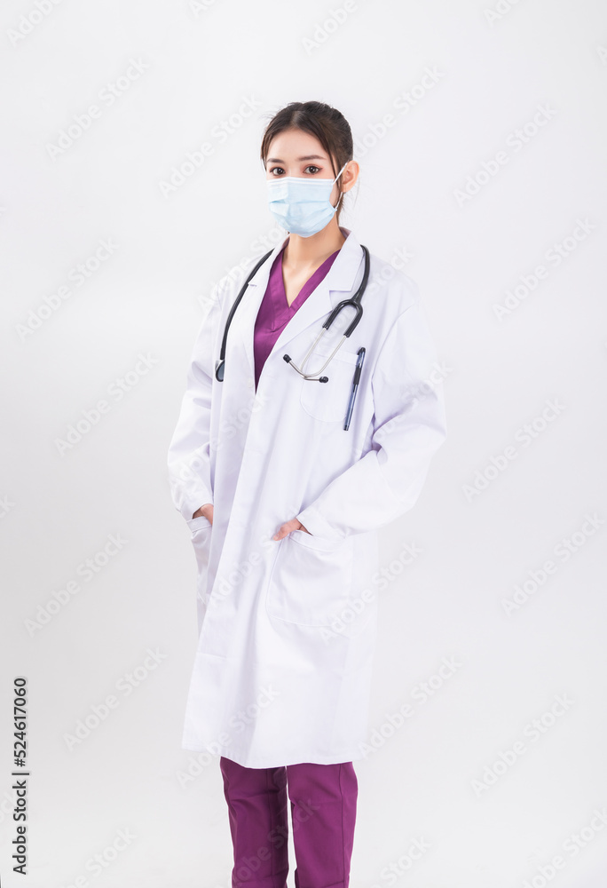 A woman doctor in a white coat A woman doctor in a white coat