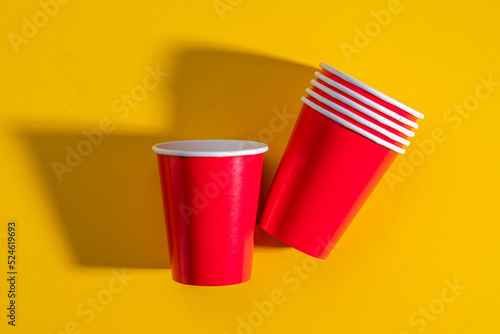 Paper cup or disposable cup made of recycled paper for party. Utensils for branding, empty space to place your brand elements and symbols