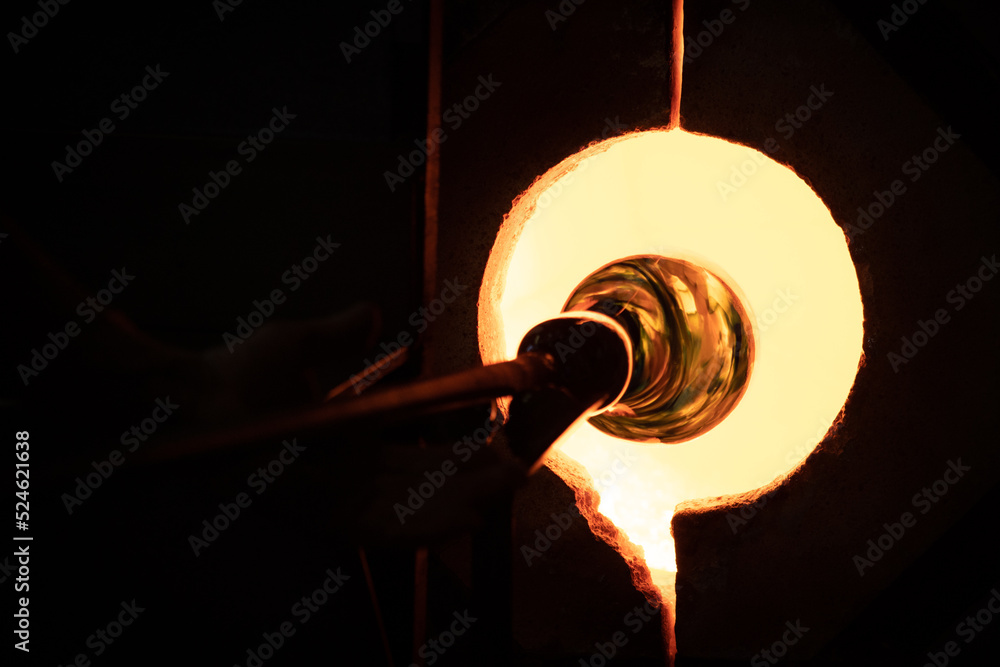Melting Glass in Red Hot Kiln getting turned Stock Photo Adobe Stock