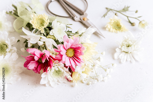 Making beautiful bouquet at flower shop. Bouquet of different flowers