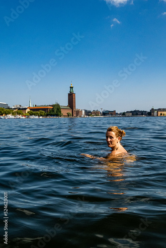 Photography Stockholm, Sweden A woman baths in Riddarjarden in downtown next to the City Hall