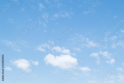 Blue sky background and white clouds soft focus, pastel sky.