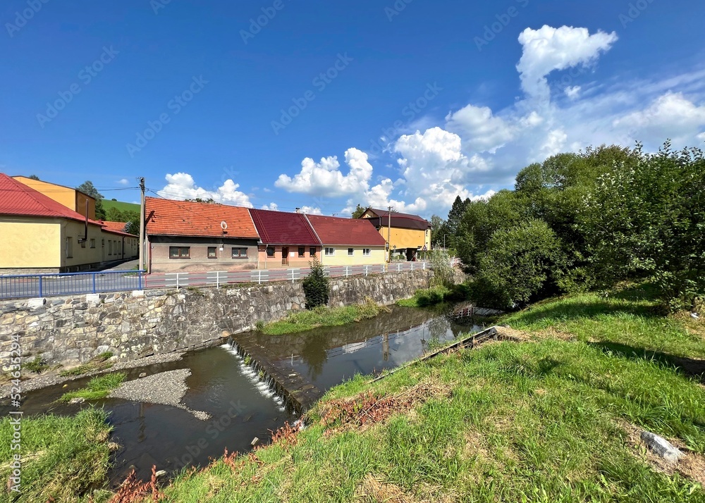 river flowing through a czech village