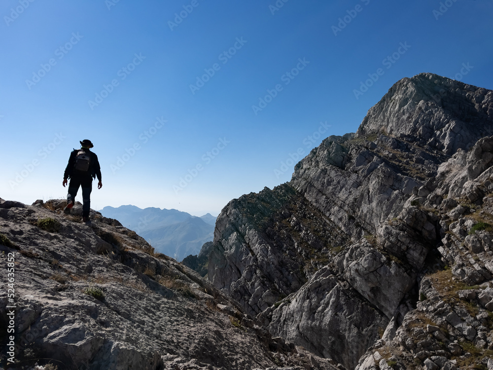 hike of mountaineer exploring on top of mountains