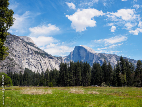 Wide angle view of Yosemite nation park, California landscape with sky and clouds