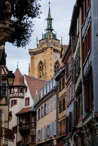 Colmar  Alsace  France  4 July 2022  town capital of Alsatian wine  narrow picturesque street with medieval colorful houses  Timber framing or post-and-beam construction  romantic city at summer day