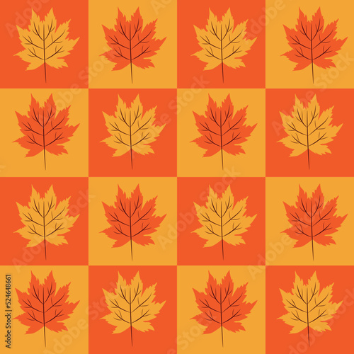 Beautiful maple leaves on orange and yellow checkerboards seamless pattern .For autumn and Thanksgiving posters  fabric   textile and wrapping paper 