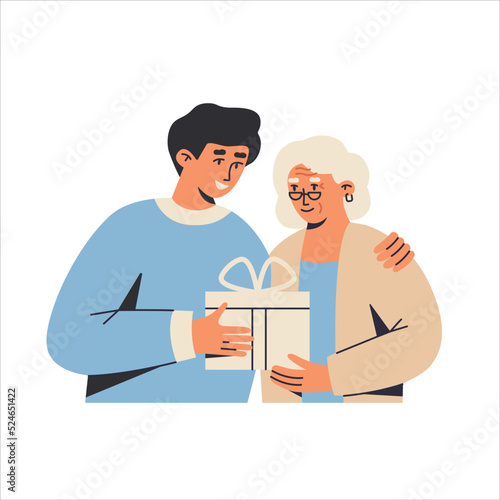 Son and mother with a gift for a holiday. Happy people gives and receives presents. 