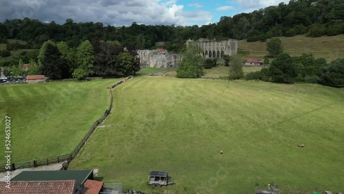 Rievaulx Abbey ree-VOH was a Cistercian abbey in Rievaulx, situated near Helmsley in the North York Moors National Park, North Yorkshire, England photo