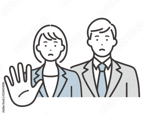 男女の若いビジネスパーソン　相手を制止するポーズ