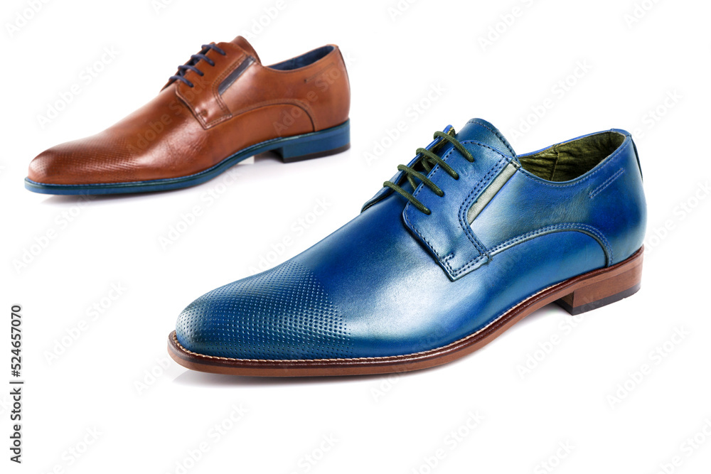 Male red and blue leather shoes on white background, isolated product. Differentiated footwear and exclusive design.