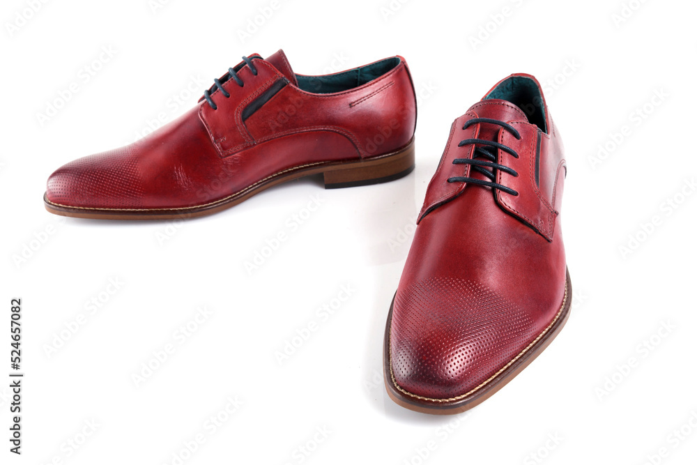 Male red leather shoes pares on white background, isolated product.