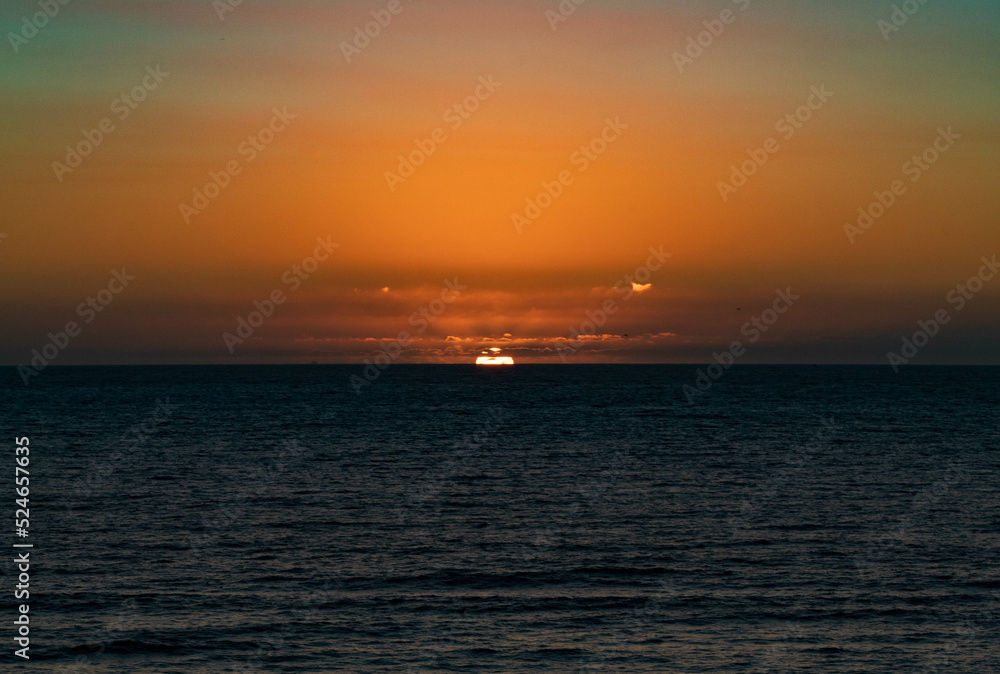 Final del Sunset en el oceano Pacifico (Horizontal)