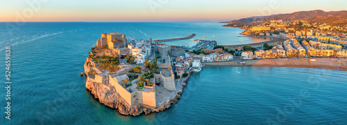Panoramic view of Peniscola during sunrise, a coastal town in eastern Spain, Costa del Azahar, Province Castello, Spain photo