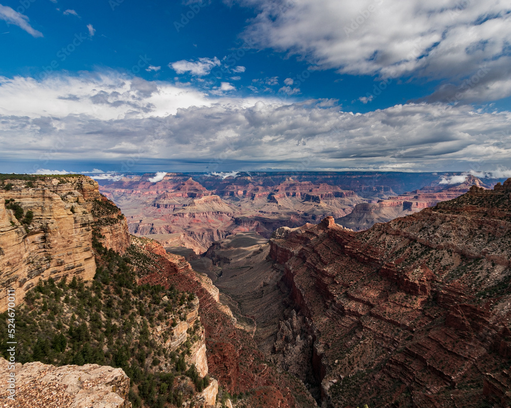red mountains from the grand canyon with gloomy sky red mountains from the grand canyon with gloomy sky
