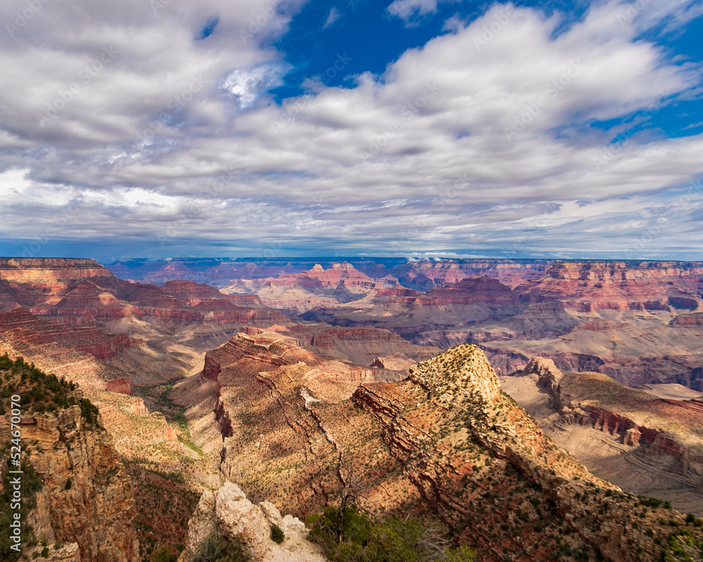 red mountains from the grand canyon with gloomy sky