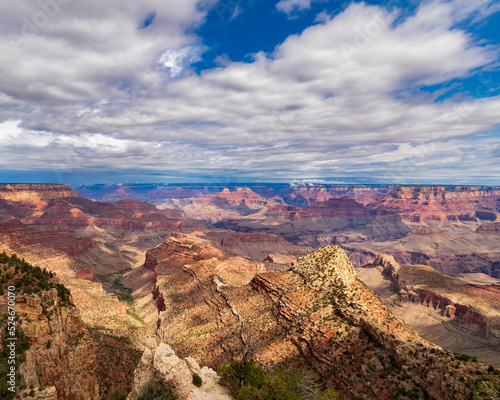 red mountains from the grand canyon with gloomy sky