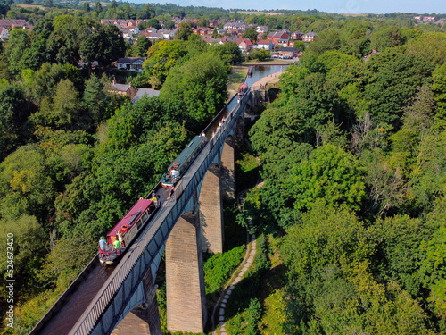 Fotografia, Obraz Aerial view of the Pontcysyllte Aqueduct that carries the Llangollen Canal across the River Dee in the Vale of Llangollen in northeast Wales