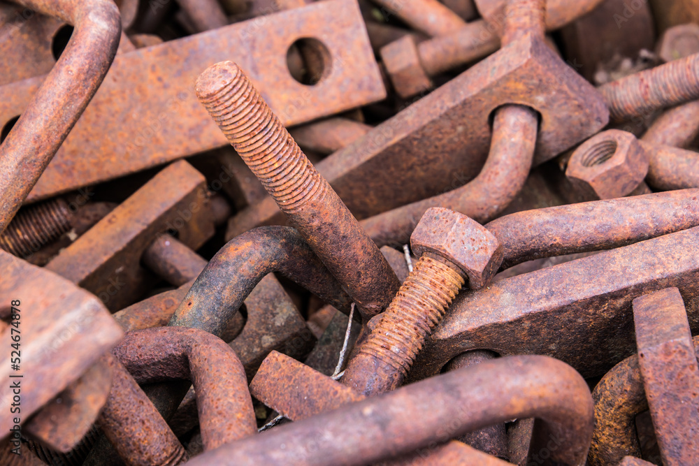 A pile of rusty junk and metal parts A pile of rusty junk and metal parts
