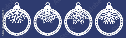 Set of laser cutting template of Christmas balls with snowflakes. Silhouette of openwork spheres with lace ornament. Xmas tree decoration for paper cut out. Vector illustration on blue background.