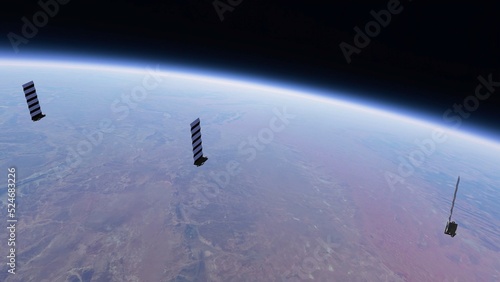 Fleet of Internet starlink satellites in orbit over earth. A line of satellites providing internet connection from space. Aerial view of satellites above earth. photo