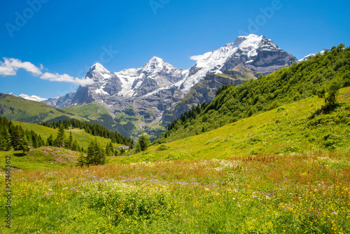 The panorma of Bernese alps with the Jungfrau, Monch and Eiger peaks.