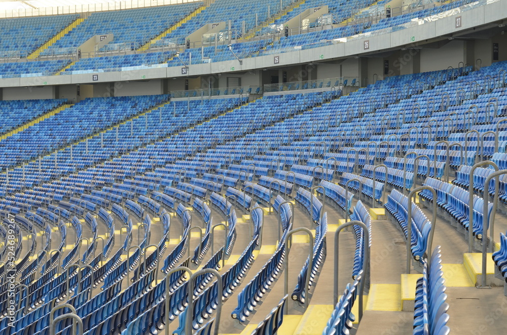 Naklejka premium the empty football stadium playground chairs