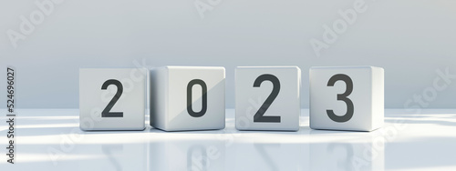 2023 Happy New Year. Gray cube block with black digit on grey background, banner. 3d render