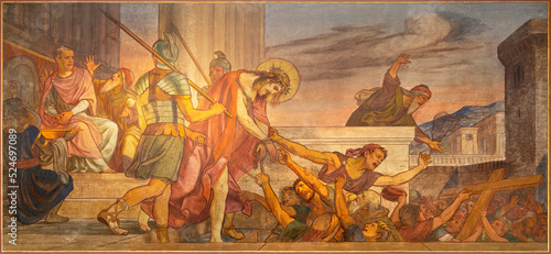 BERN, SWITZERLAND - JUNY 27, 2022: The fresco of Jesus judgment before Pilate in the church Dreifaltigkeitskirche by August Müller (1923).