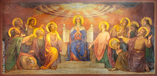 BERN, SWITZERLAND - JUNY 27, 2022: The fresco of Pentecost in the church Dreifaltigkeitskirche by August Müller (1923).