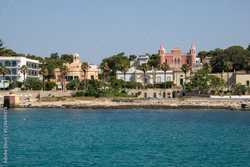 the town  Santa Maria di Leuca and liberty villas and traditional bagnarole  as seen from sea, Apulia region Italy