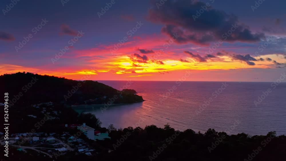 Thailand Phuket island sunset. Vivid sky on sea horizon Thailand Phuket island sunset. Vivid sky on sea horizon