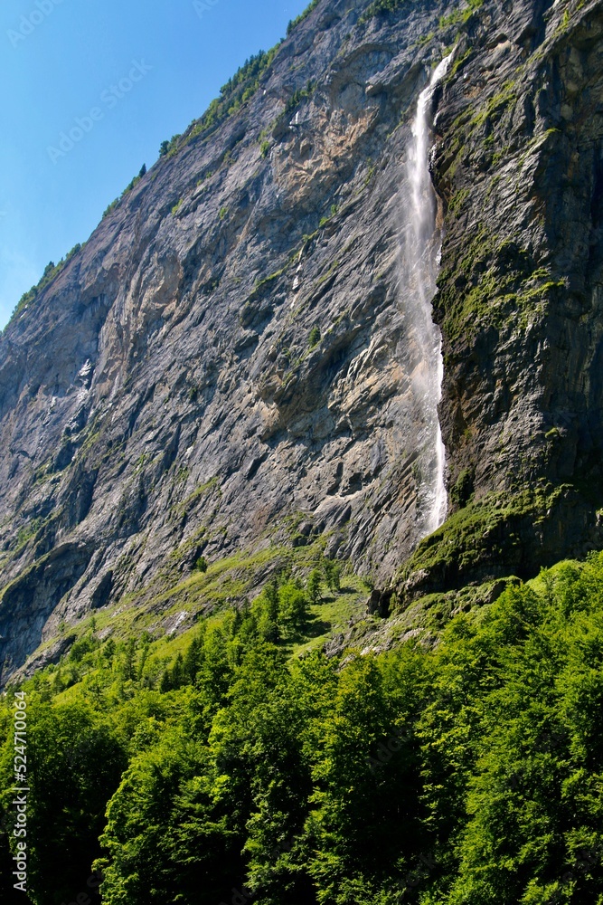 waterfall in the mountains Staubachfall, Lauterbrunner, Switzerland.