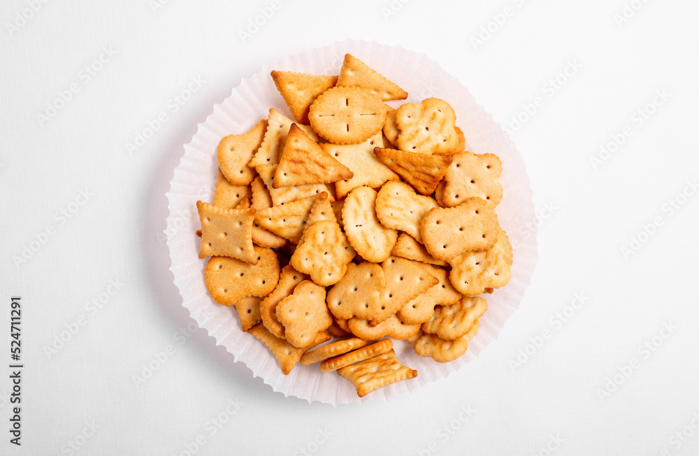 Dry salty cracker cookies on gray stone background. Dry salty cracker cookies on gray stone background.