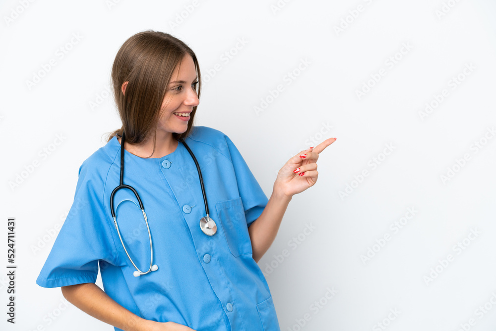 Young surgeon doctor Lithuanian woman isolated on white background pointing finger to the side and presenting a product Young surgeon doctor Lithuanian woman isolated on white background pointing finger to the side and presenting a product