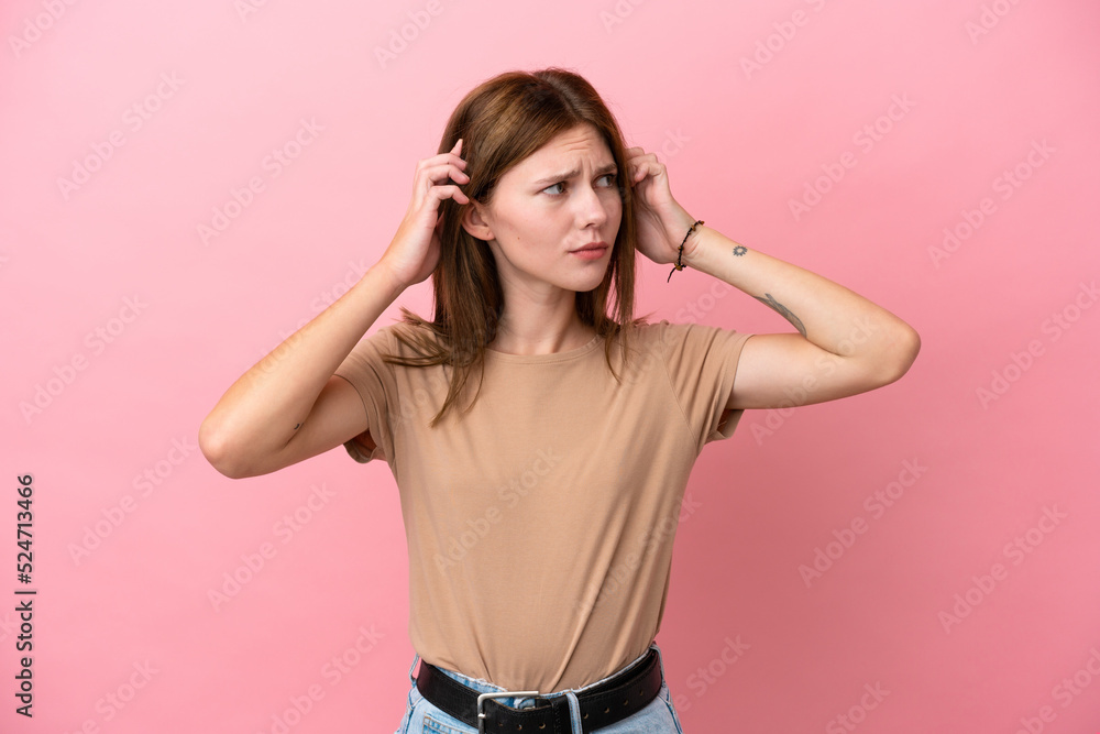 Young English woman isolated on pink background having doubts and thinking Young English woman isolated on pink background having doubts and thinking