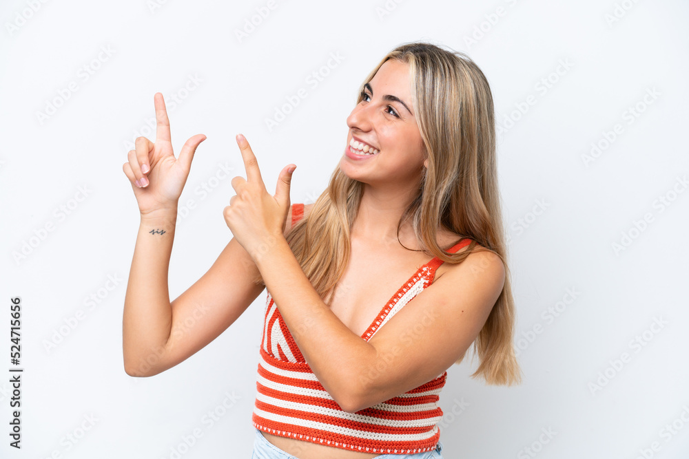 Young caucasian woman isolated on white background pointing with the index finger a great idea
