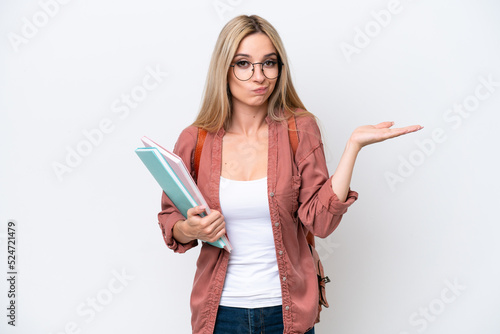 Pretty student blonde woman isolated on white background having doubts while raising hands
