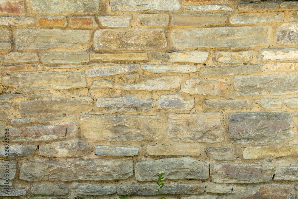 Old gray stone wall. Stone background from gray old stones. Old gray stone wall. Stone background from gray old stones.