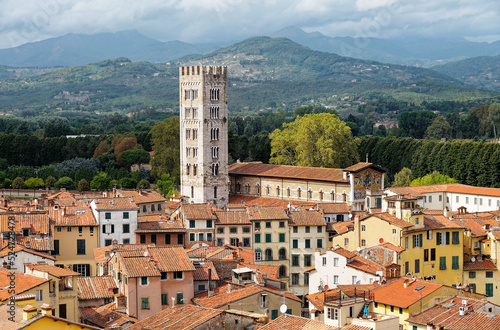 The tower of the Basilica di San Frediano rises above the mediaeval city of Lucca, Tuscany, Italy.