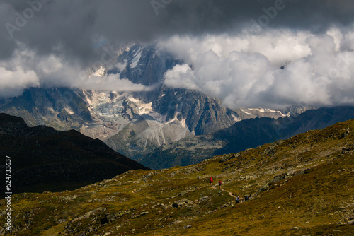 Several tiny hikers on the trail between Aiguillette des Houches and Refuge de Bellachat (near Chamonix and Les Houches), early September.