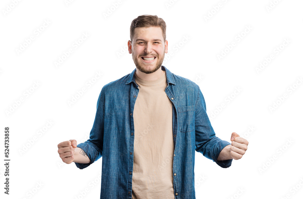 Happy excited man standing in victory position over white studio background. Handsome guy with cheerful facial expression doing winner gesture with hands. Happy excited man standing in victory position over white studio background. Handsome guy with cheerful facial expression doing winner gesture with hands.