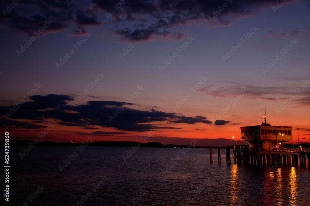 Sunset on lake Trasimeno from Passignano, Italy	