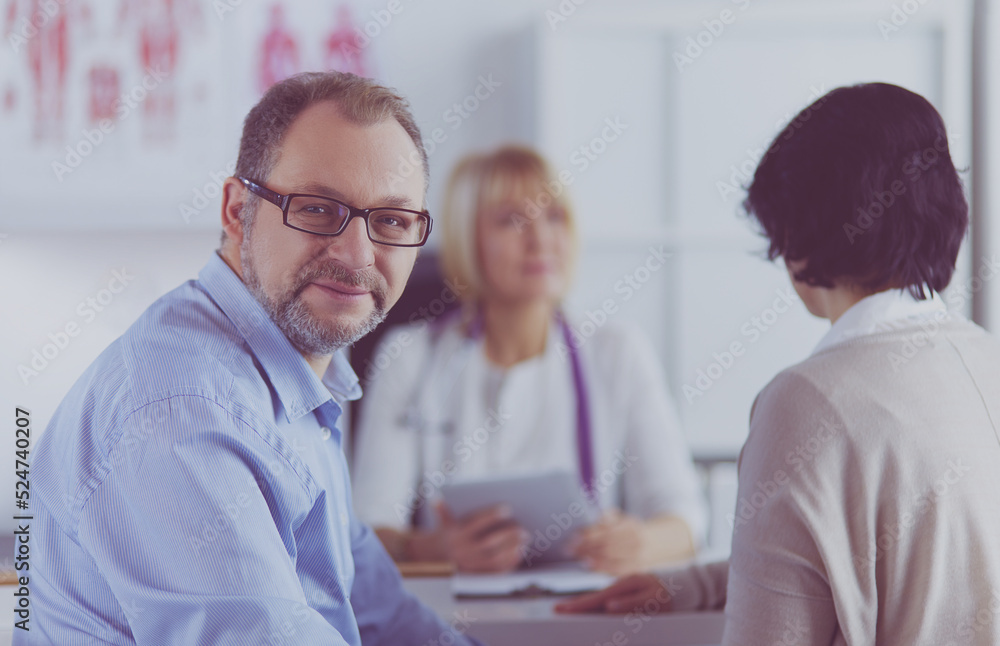 Smiling medical doctor and patient. Health care Smiling medical doctor and patient. Health care